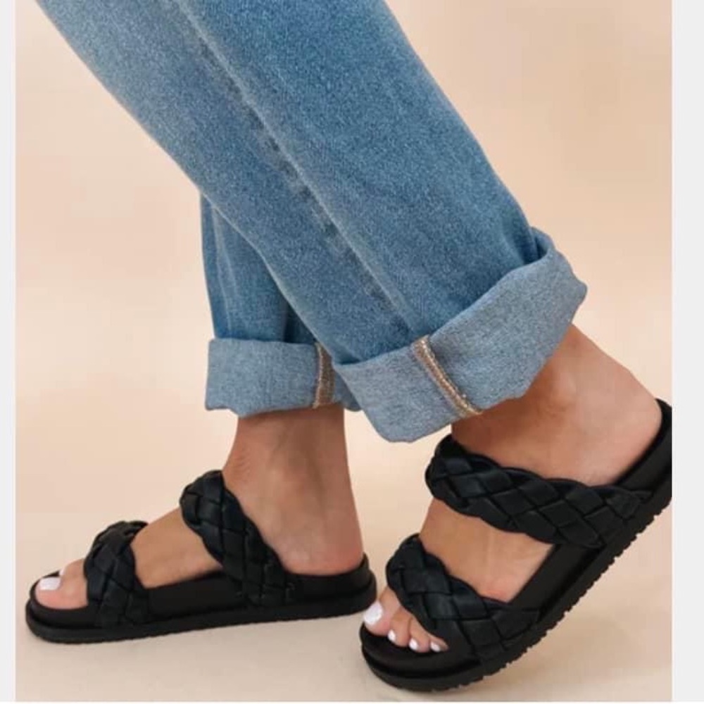 Black braided women’s sandals.